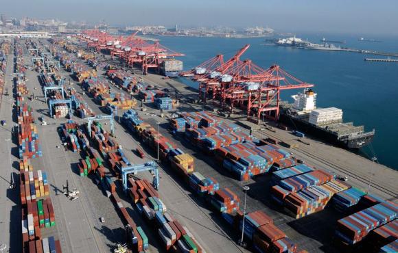 Containers and ships sit idle at the Port of Long Beach in this file photo